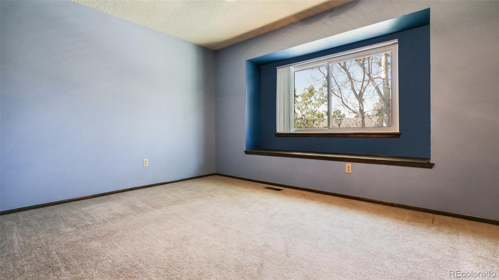 82 Prairie Ridge Road Highlands Ranch, CO 80126 - Photo 20 of 29 a view of a window in an empty room