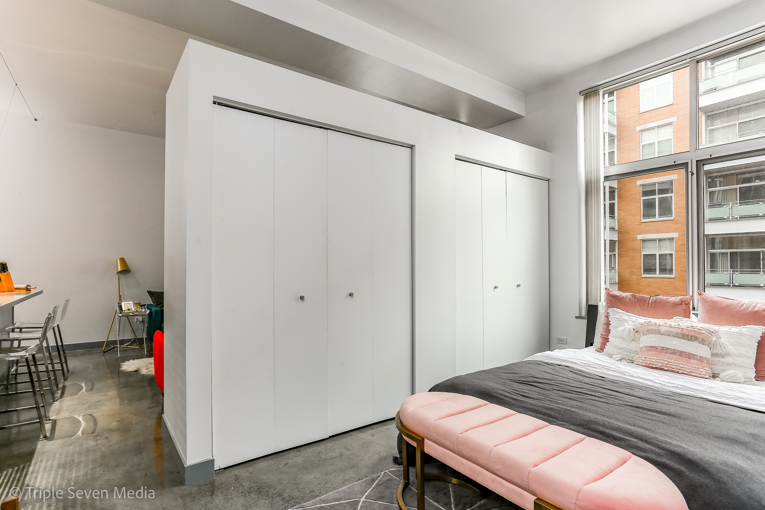 939 West Madison Street, Unit 206 Chicago, IL 60607 - Photo 11 of 20 a bedroom with a bed and a window
