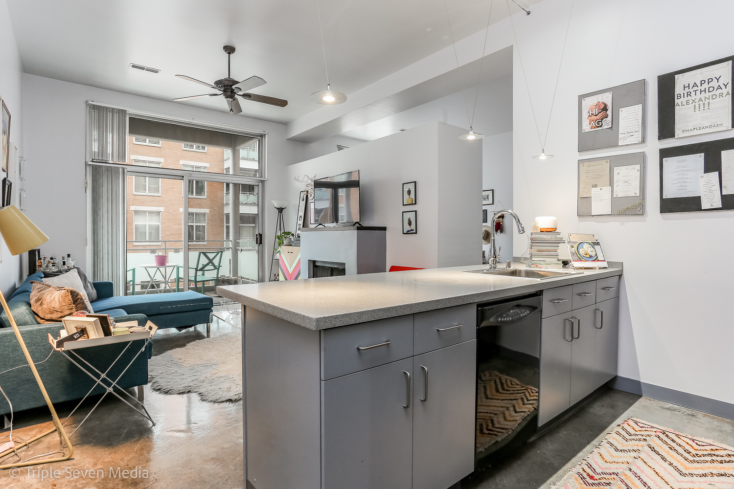 939 West Madison Street, Unit 206 Chicago, IL 60607 - Photo 6 of 20 a kitchen with a sink and chairs