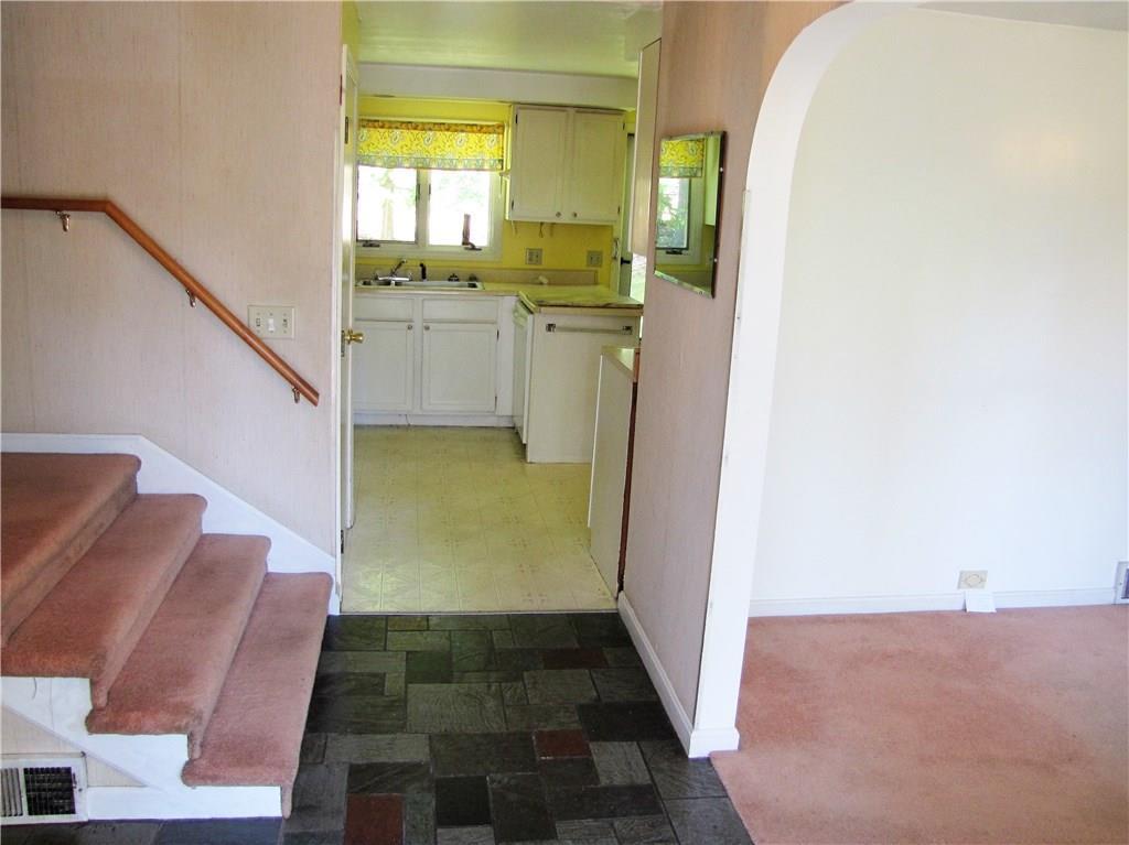 1193 Sunshine Road Deer Isle, ME 04627 - Photo 6 of 23 Front foyer. Steps leading up to...