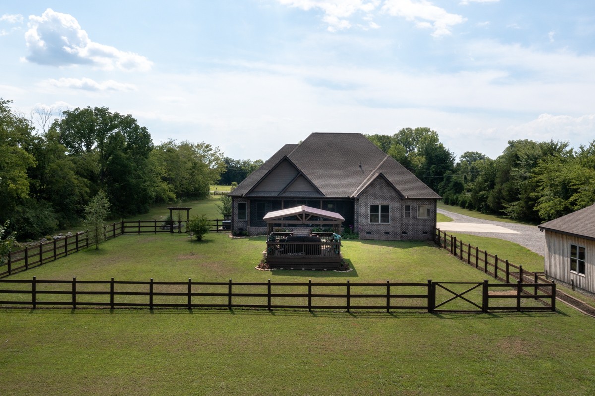 2793 Thompson Road Murfreesboro, TN 37128 - Photo 39 of 62 a table and chairs sitting in the middle of a lake