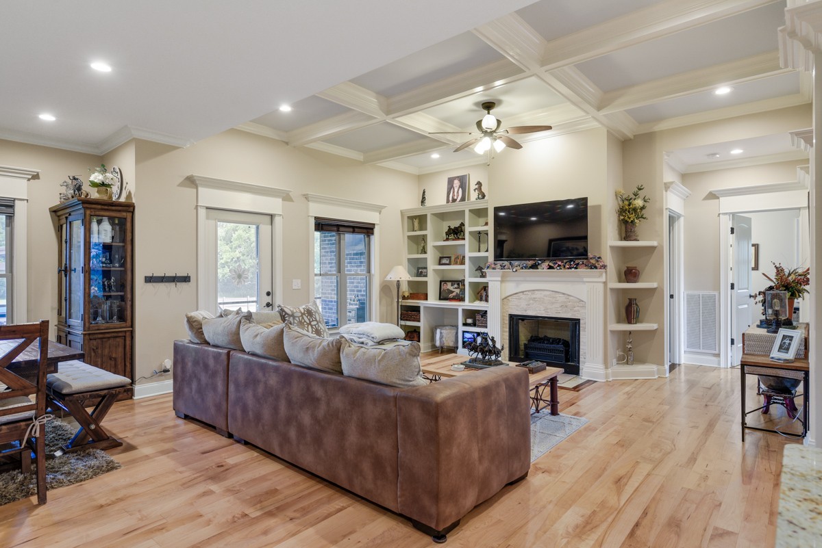 2793 Thompson Road Murfreesboro, TN 37128 - Photo 8 of 62 a living room with furniture a fireplace and a flat screen tv