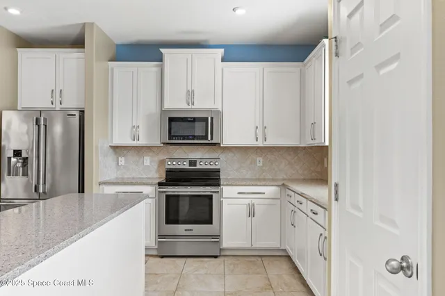 a living room with furniture and window