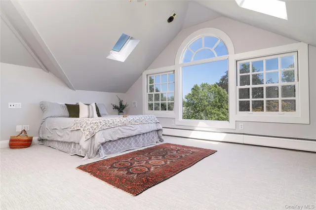 a view of workspace with furniture and window