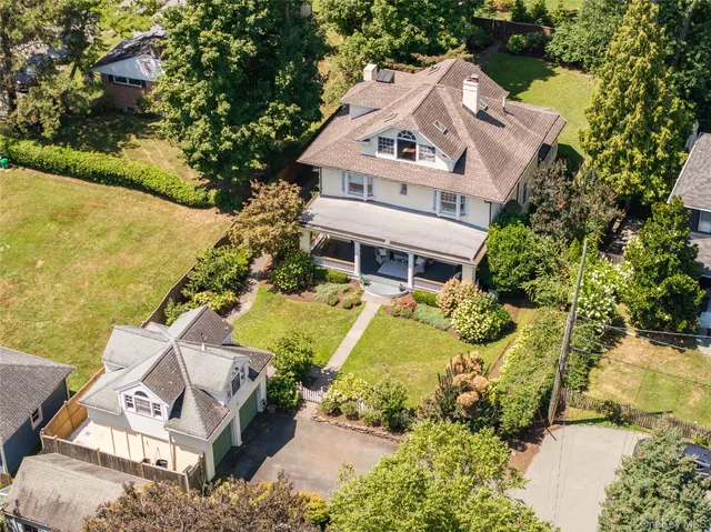 an aerial view of a house with a garden