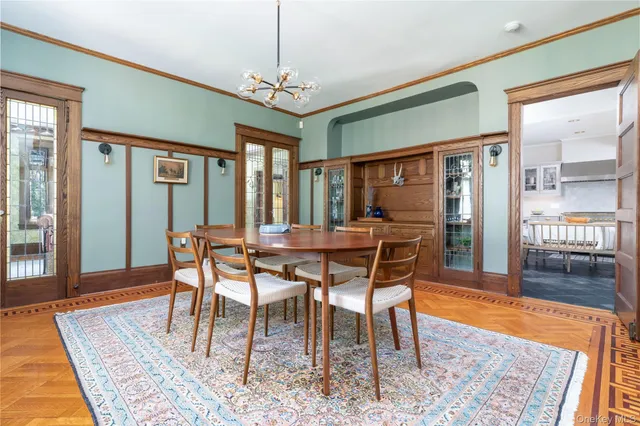 a kitchen with a stove a sink and a refrigerator