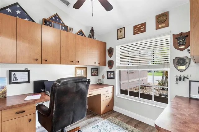 a kitchen with stainless steel appliances granite countertop a stove and a refrigerator