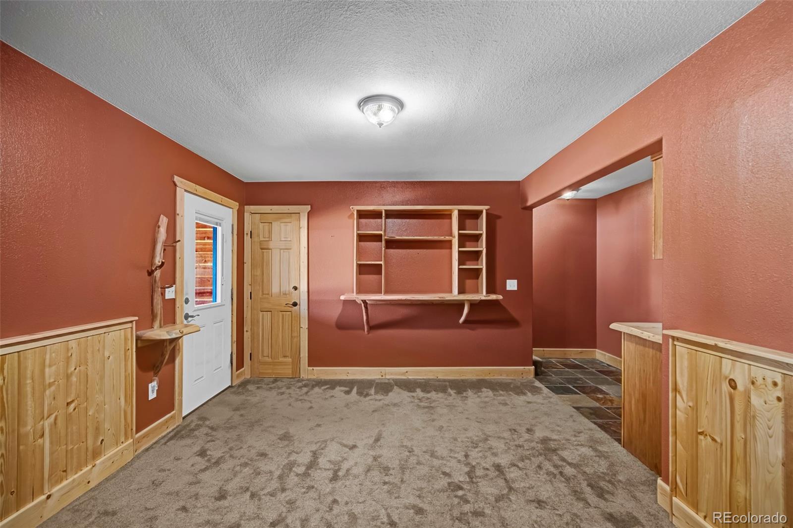 2491 Stagestop Road Jefferson, CO 80456 - Photo 20 of 46 a livingroom with furniture