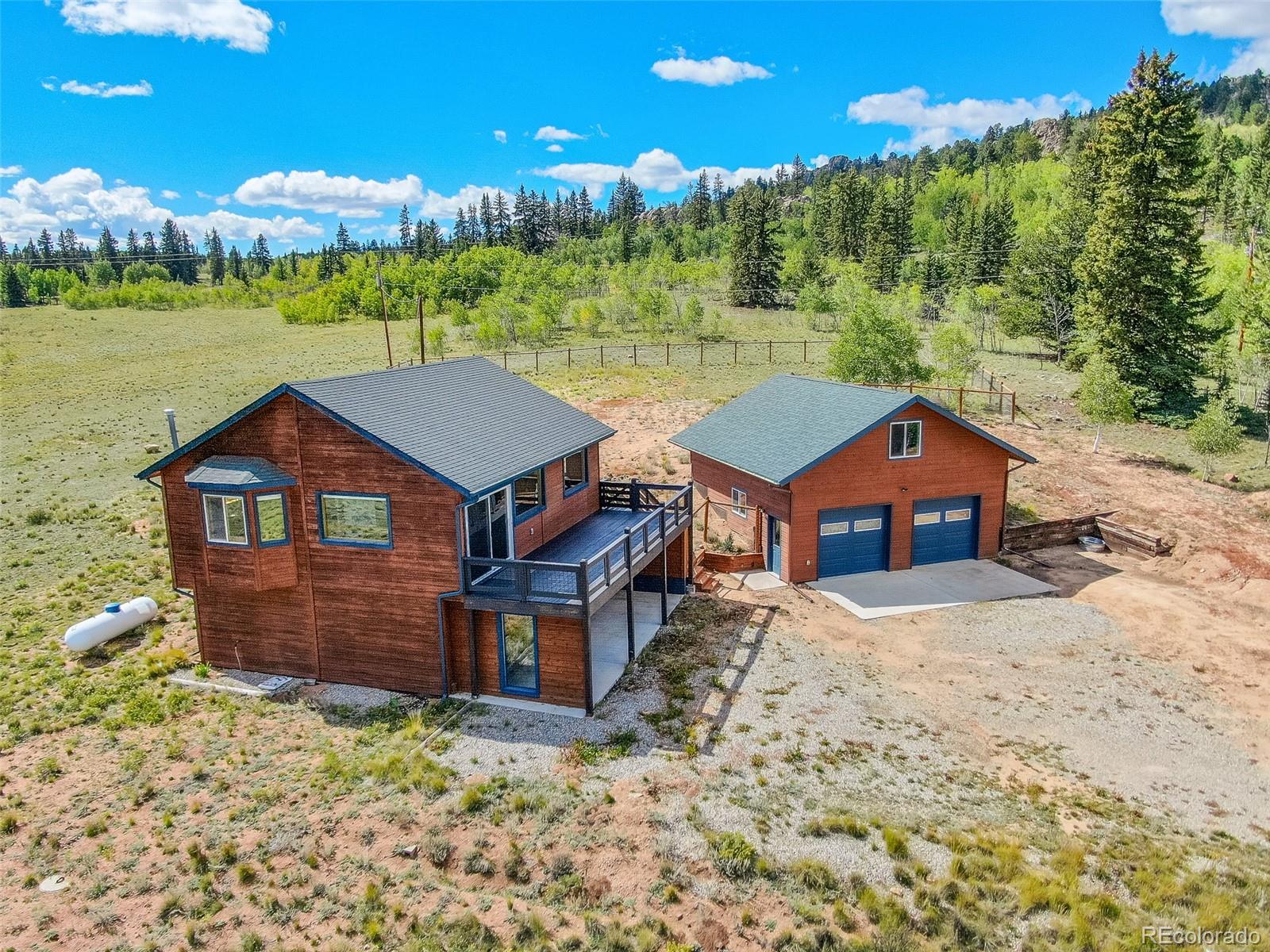 2491 Stagestop Road Jefferson, CO 80456 - Photo 27 of 46 a house view with a garden space