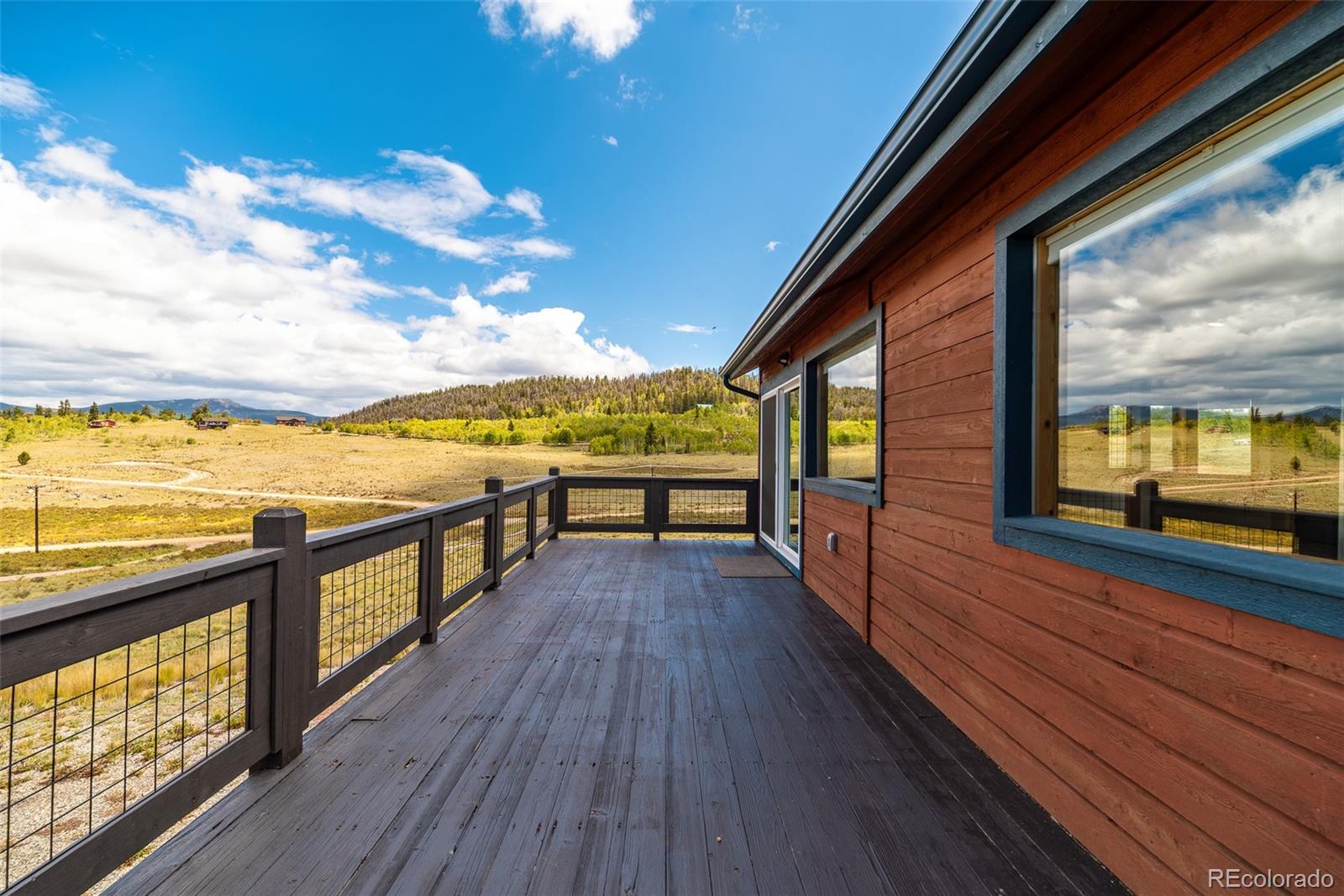2491 Stagestop Road Jefferson, CO 80456 - Photo 37 of 46 a view of city from a balcony