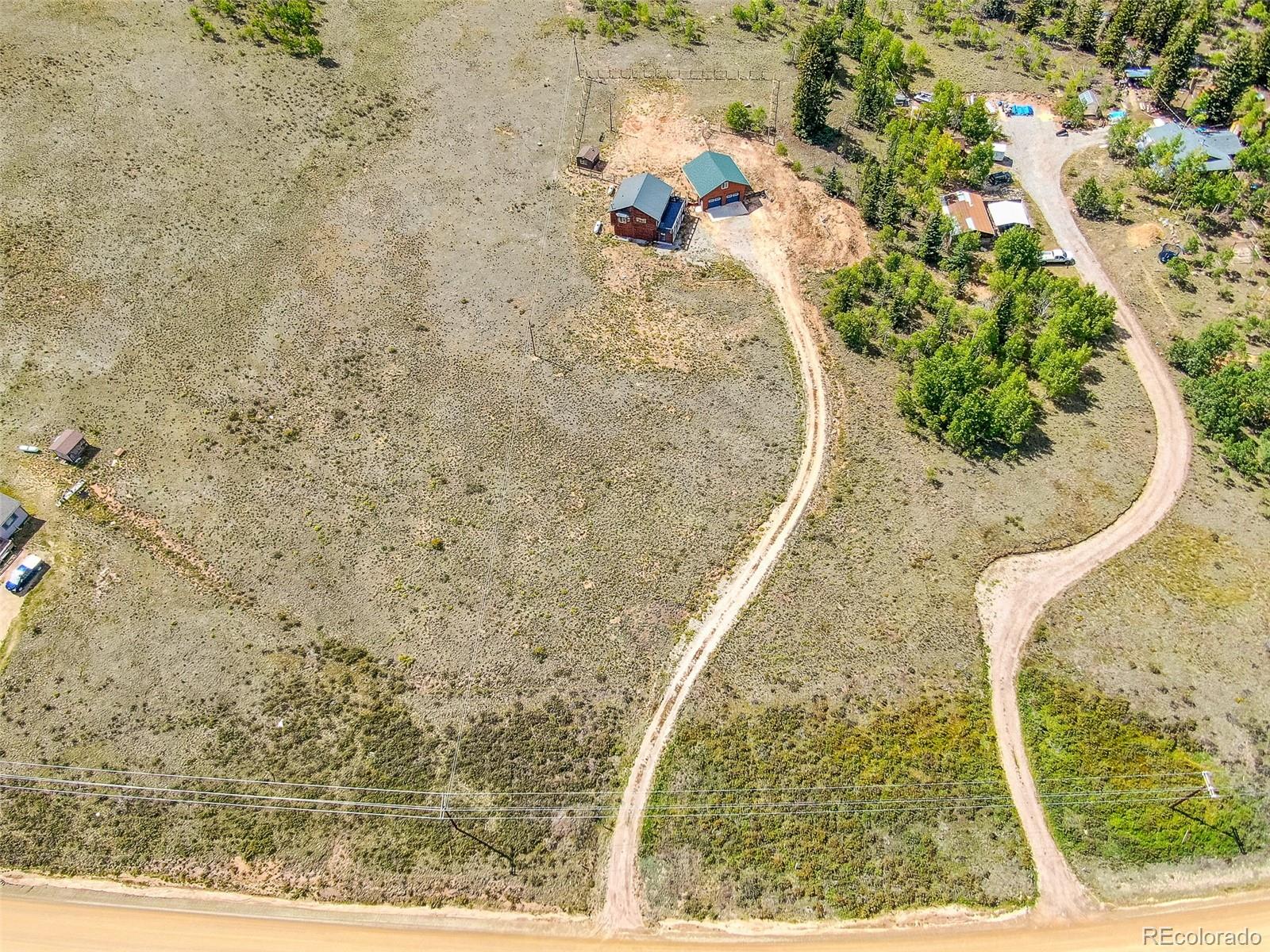 2491 Stagestop Road Jefferson, CO 80456 - Photo 41 of 46 view of a wooden floor with a bench
