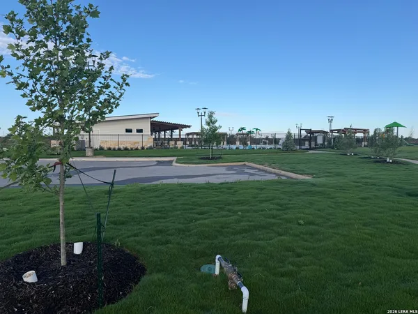 a view of a golf course with a garden