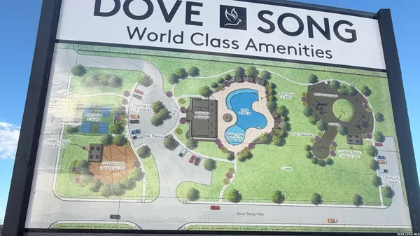 a sign on a window of a red brick building