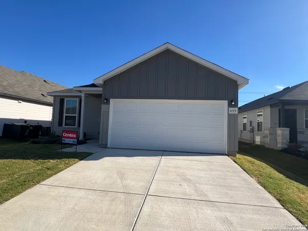 a front view of house with yard