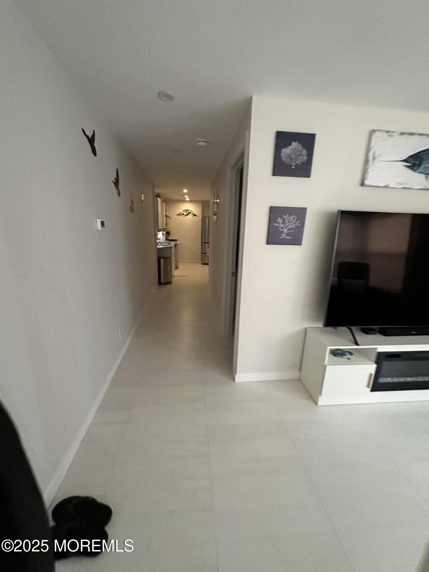 106 Wallace Street, Unit B Red Bank, NJ 07701 - Photo 12 of 19 a view of living room with furniture and a flat screen tv