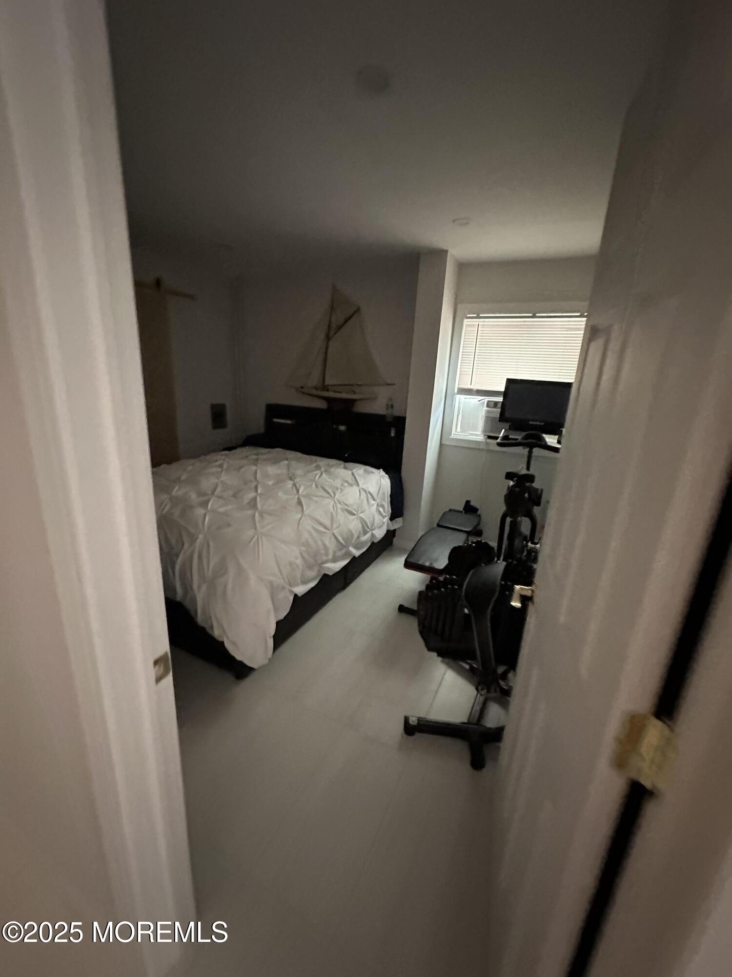 106 Wallace Street, Unit B Red Bank, NJ 07701 - Photo 14 of 19 a bedroom with a bed and a dresser