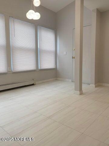 106 Wallace Street, Unit B Red Bank, NJ 07701 - Photo 4 of 19 a view of an empty room with a window
