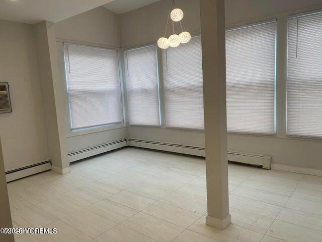 106 Wallace Street, Unit B Red Bank, NJ 07701 - Photo 5 of 19 an empty room with windows