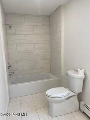 106 Wallace Street, Unit B Red Bank, NJ 07701 - Photo 10 of 19 a white toilet and tub sitting next to a bathroom sink