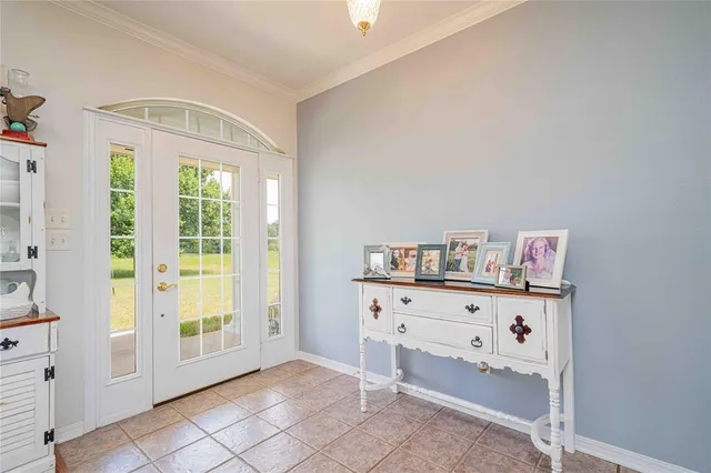 a view of room with window and hardwood floor