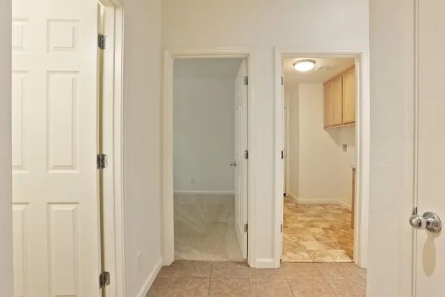 a view of a bathroom with a glass shower door