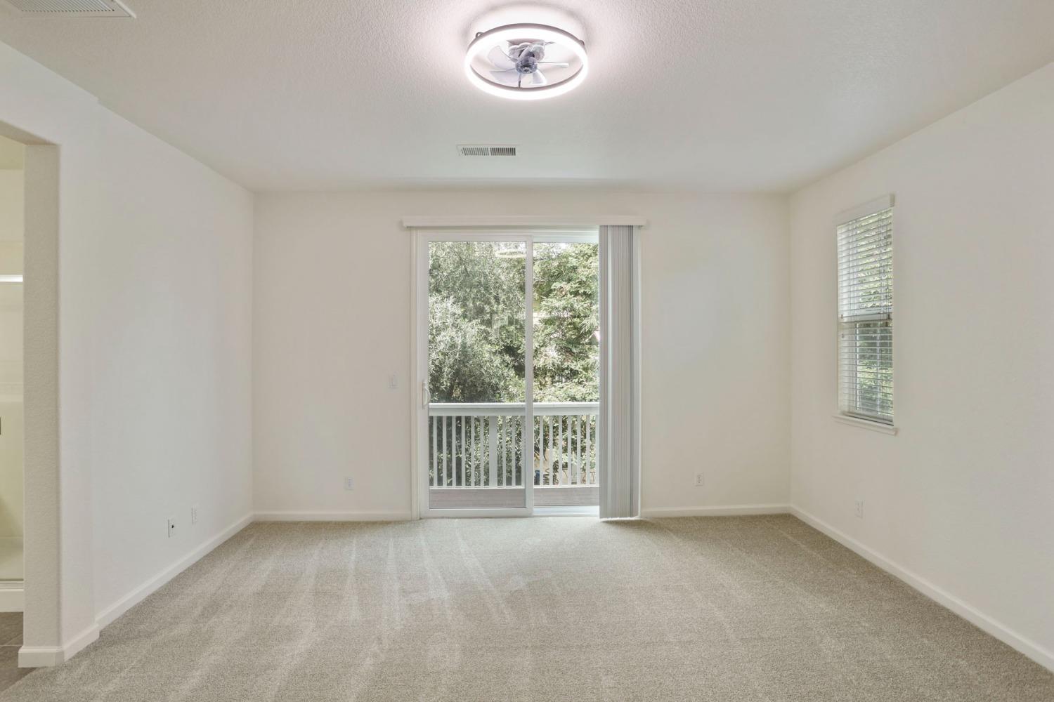 9363 Vintner Circle Patterson, CA 95363 - Photo 34 of 52 an empty room with a window