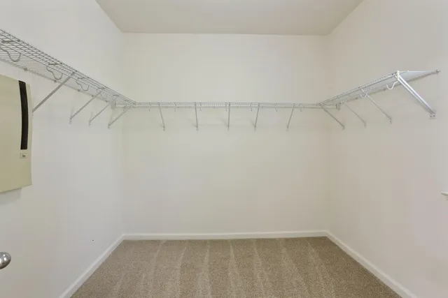 a view of a balcony with wooden floor