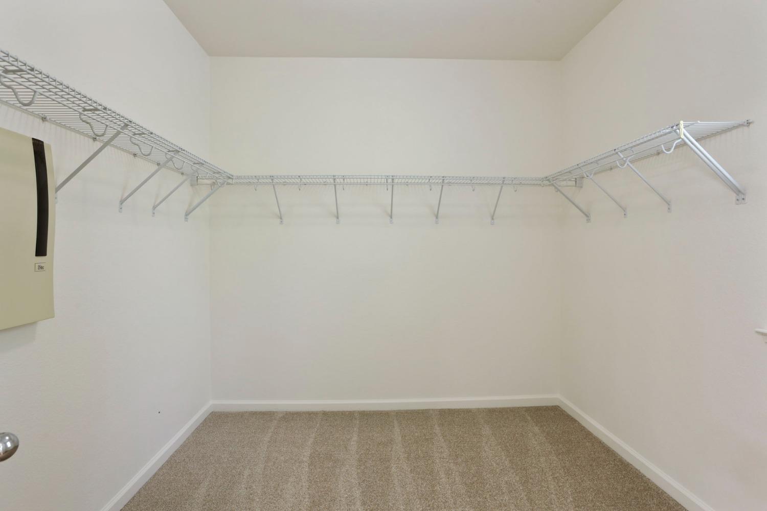 9363 Vintner Circle Patterson, CA 95363 - Photo 40 of 52 a view of a room with racks on the wall