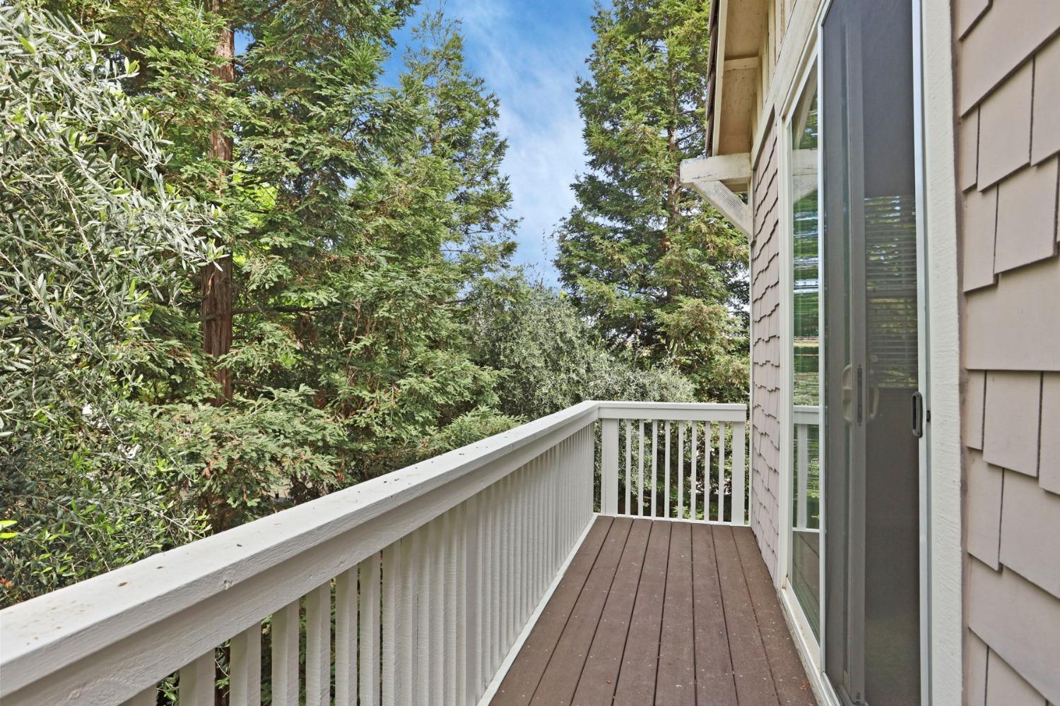 9363 Vintner Circle Patterson, CA 95363 - Photo 42 of 52 a view of a balcony with wooden floor