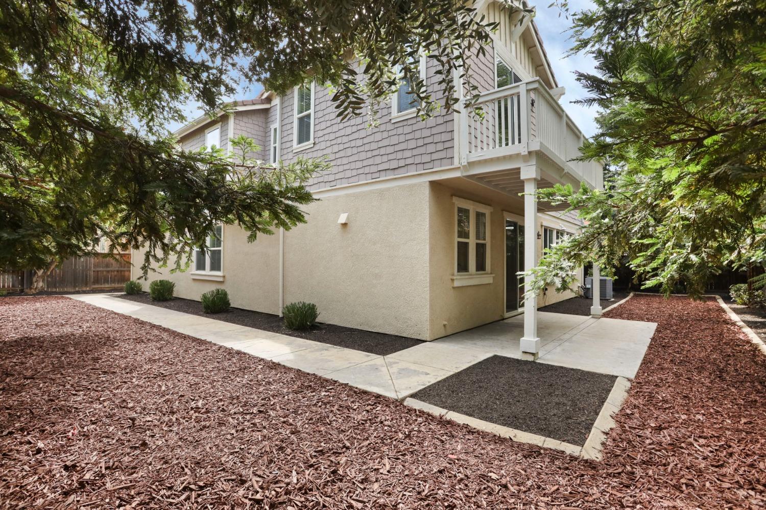 9363 Vintner Circle Patterson, CA 95363 - Photo 45 of 52 a view of a front of house with a yard