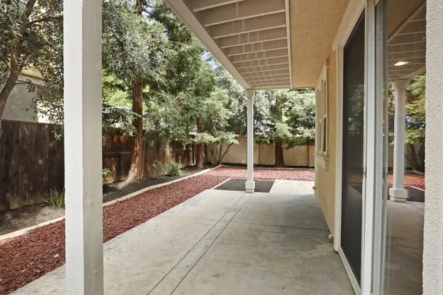 a backyard of a house with lots of green space