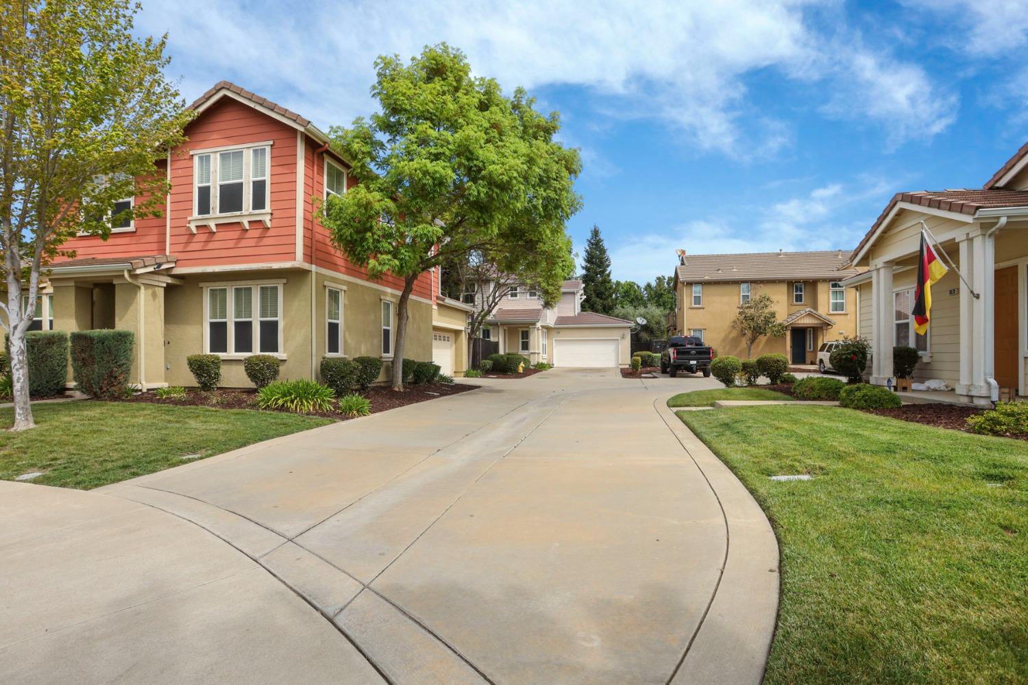 9363 Vintner Circle Patterson, CA 95363 - Photo 52 of 52 a front view of a house with a yard