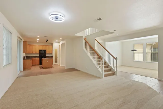 a view of a kitchen with furniture and a kitchen