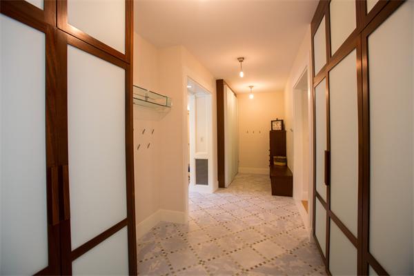 103 Rolling Lane Weston, MA 02493 - Photo 12 of 25 a view of a bathroom with a shower and a sink