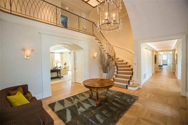 103 Rolling Lane Weston, MA 02493 - Photo 14 of 25 a living room with furniture and a chandelier