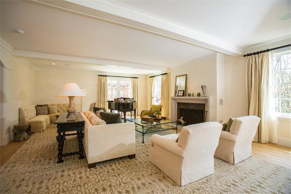 103 Rolling Lane Weston, MA 02493 - Photo 15 of 25 a living room with fireplace furniture and a window