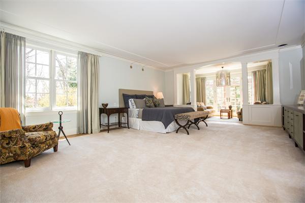 103 Rolling Lane Weston, MA 02493 - Photo 17 of 25 a living room with furniture and a large window
