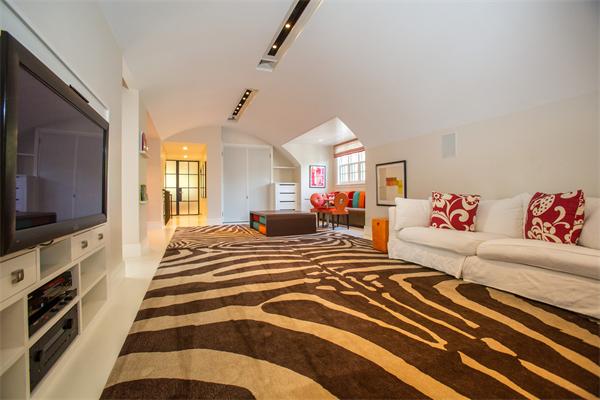 103 Rolling Lane Weston, MA 02493 - Photo 22 of 25 a bedroom with furniture and a flat screen tv