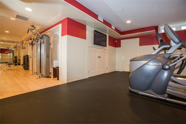 103 Rolling Lane Weston, MA 02493 - Photo 24 of 25 a view of a room with gym equipment