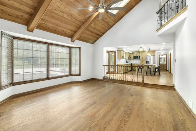 a view of an entryway with wooden floor