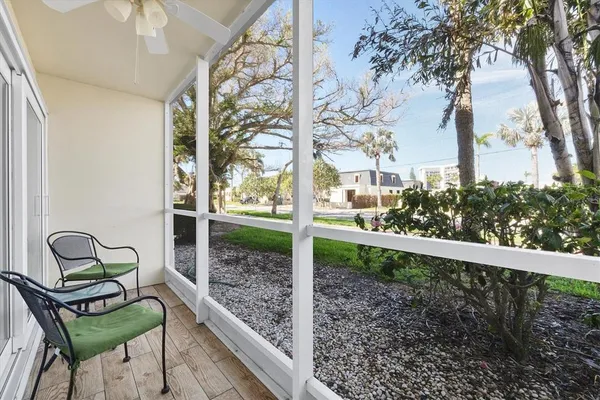 a view of a bench in the backyard