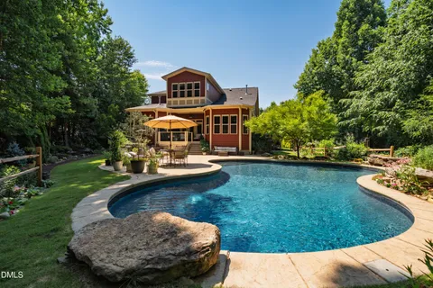 $975,000 | 212 Middlegreen Place, Holly Springs, NC 27540