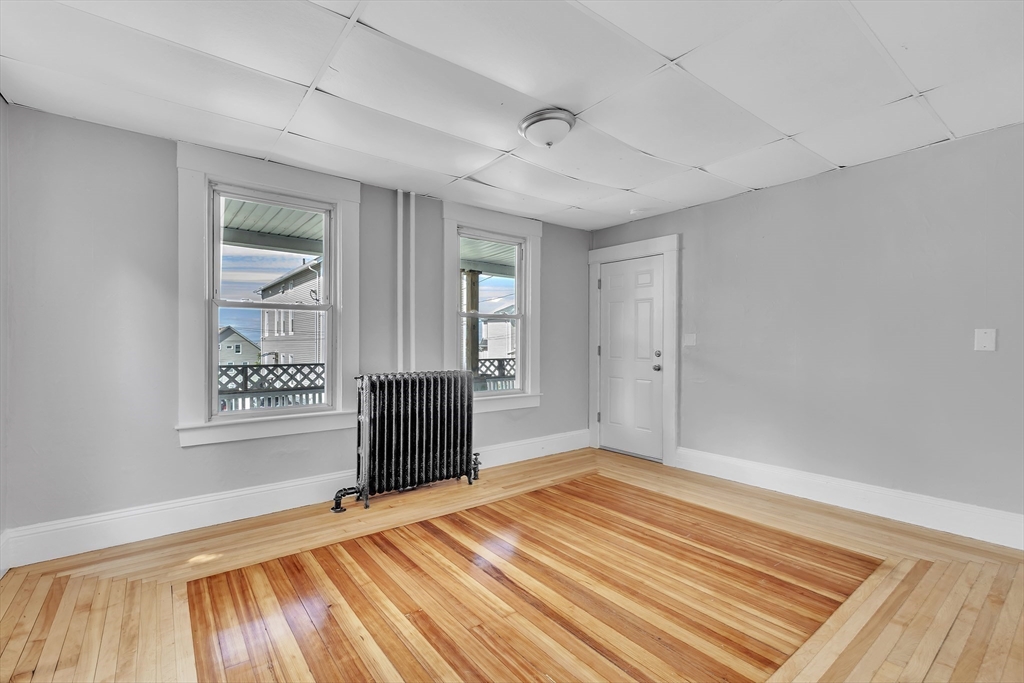256 Whipple Street Fall River, MA 02721 - Photo 27 of 42 a view of an empty room with a window