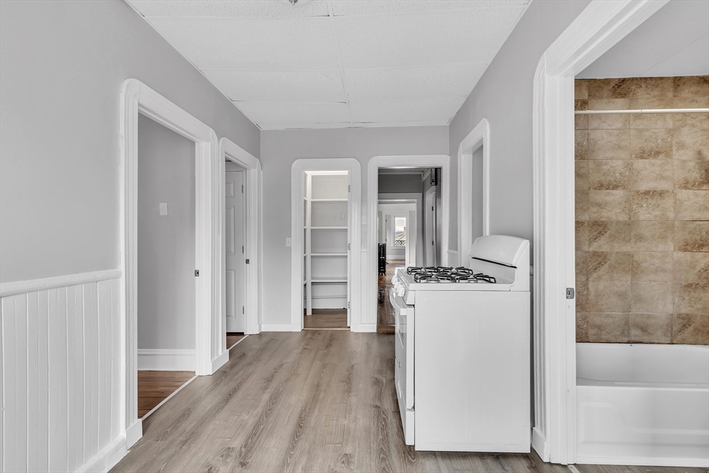 256 Whipple Street Fall River, MA 02721 - Photo 8 of 42 wooden floor with white walls