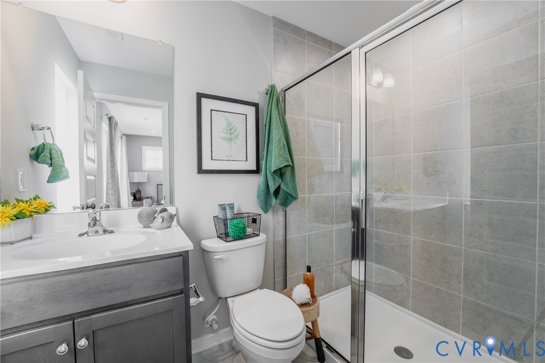 3457 Broadwick Road Richmond, VA 23234 - Photo 13 of 25 a bathroom with a sink toilet and shower