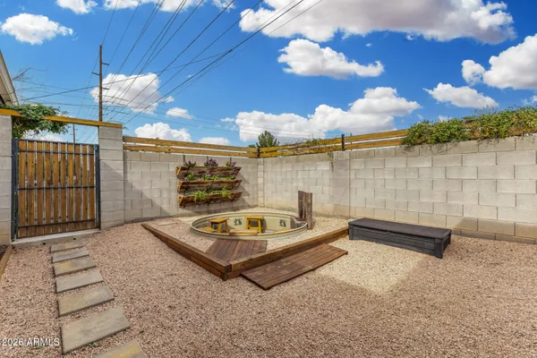 a view of a terrace with sitting area