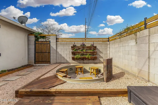 a view of a fireplace and a chandelier