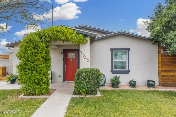 a house view with a garden space