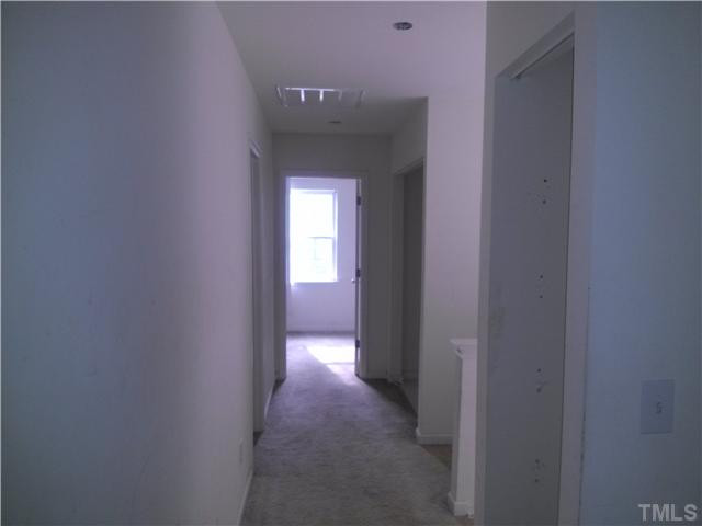 2817 Filbert Street Raleigh, NC 27610 - Photo 9 of 11 2nd floor hallway that leades to bedrooms, full bath, laundry room, and small office nook.