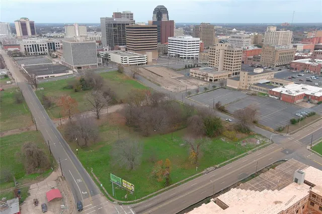 a view of swimming pool from a balcony